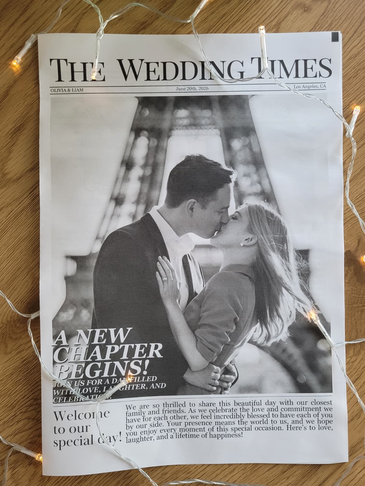 Elovaine wedding newspaper flat lay with fairy lights